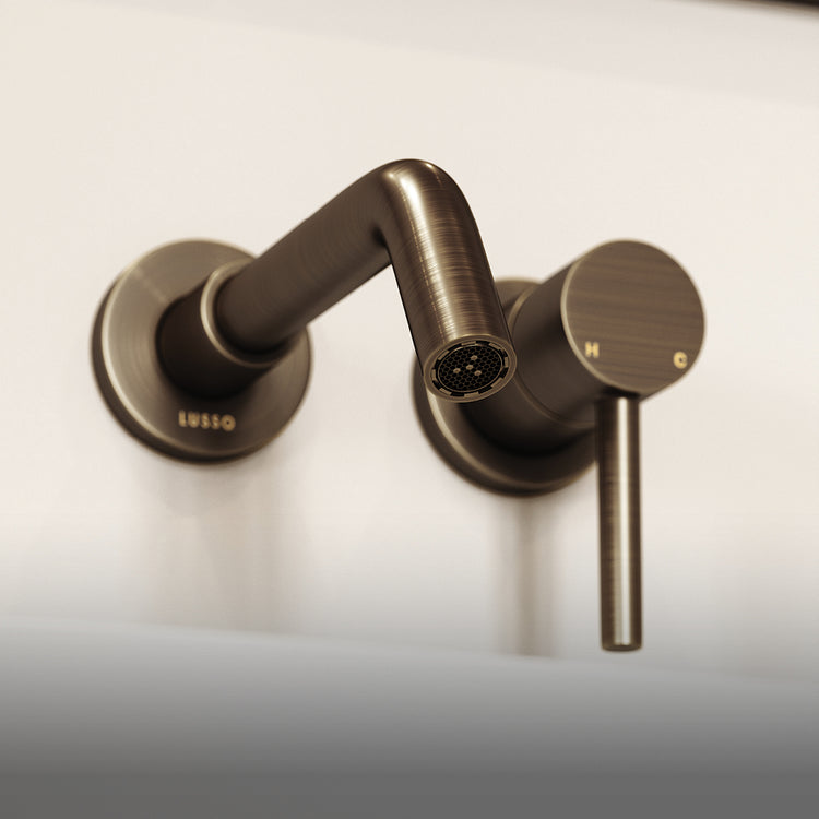 Bronze faucet on a white background