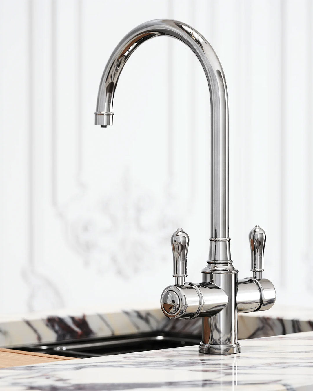 Chrome kitchen faucet on a marble countertop with a white curtain background
