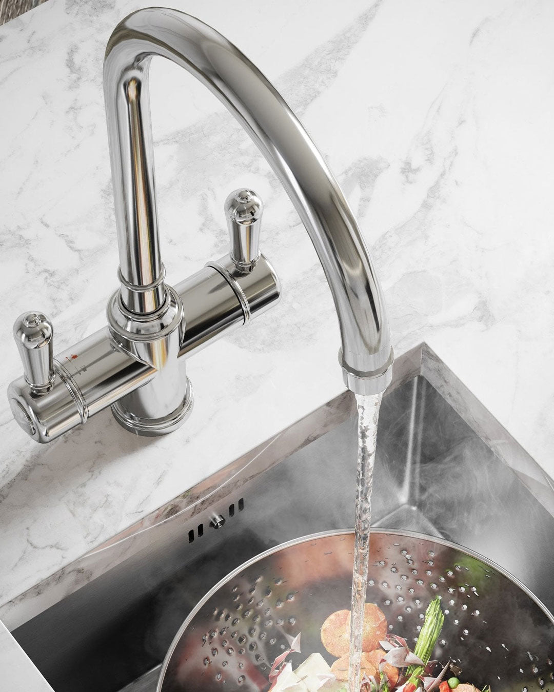 Chrome kitchen faucet with water flowing into a sink filled with vegetables.