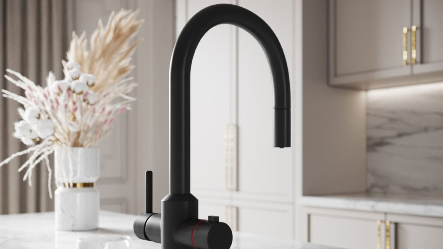 Black kitchen faucet in a modern kitchen setting with decorative elements.