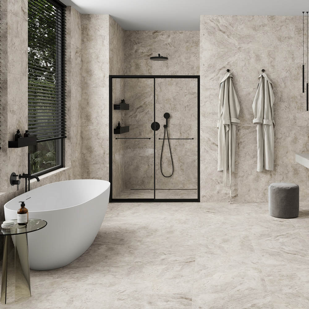 Modern bathroom with a freestanding bathtub and shower area.