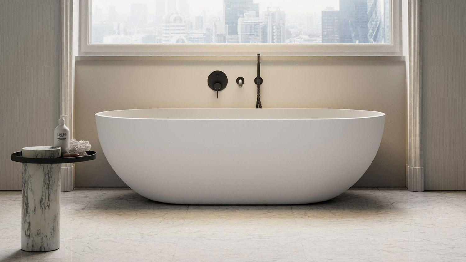 Modern freestanding bathtub in a bathroom with a cityscape view.