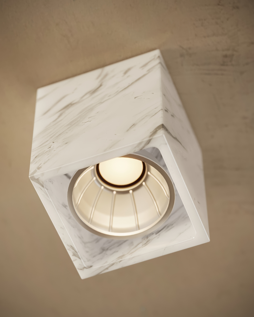 Marble-textured ceiling light fixture on a beige wall