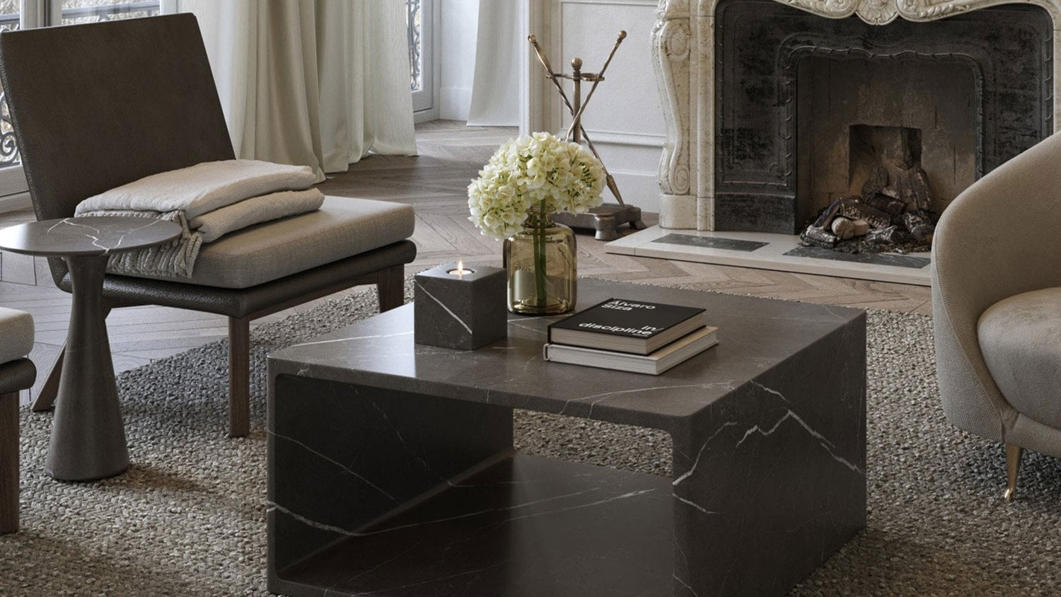 Modern living room with a fireplace, coffee table, and decorative items.