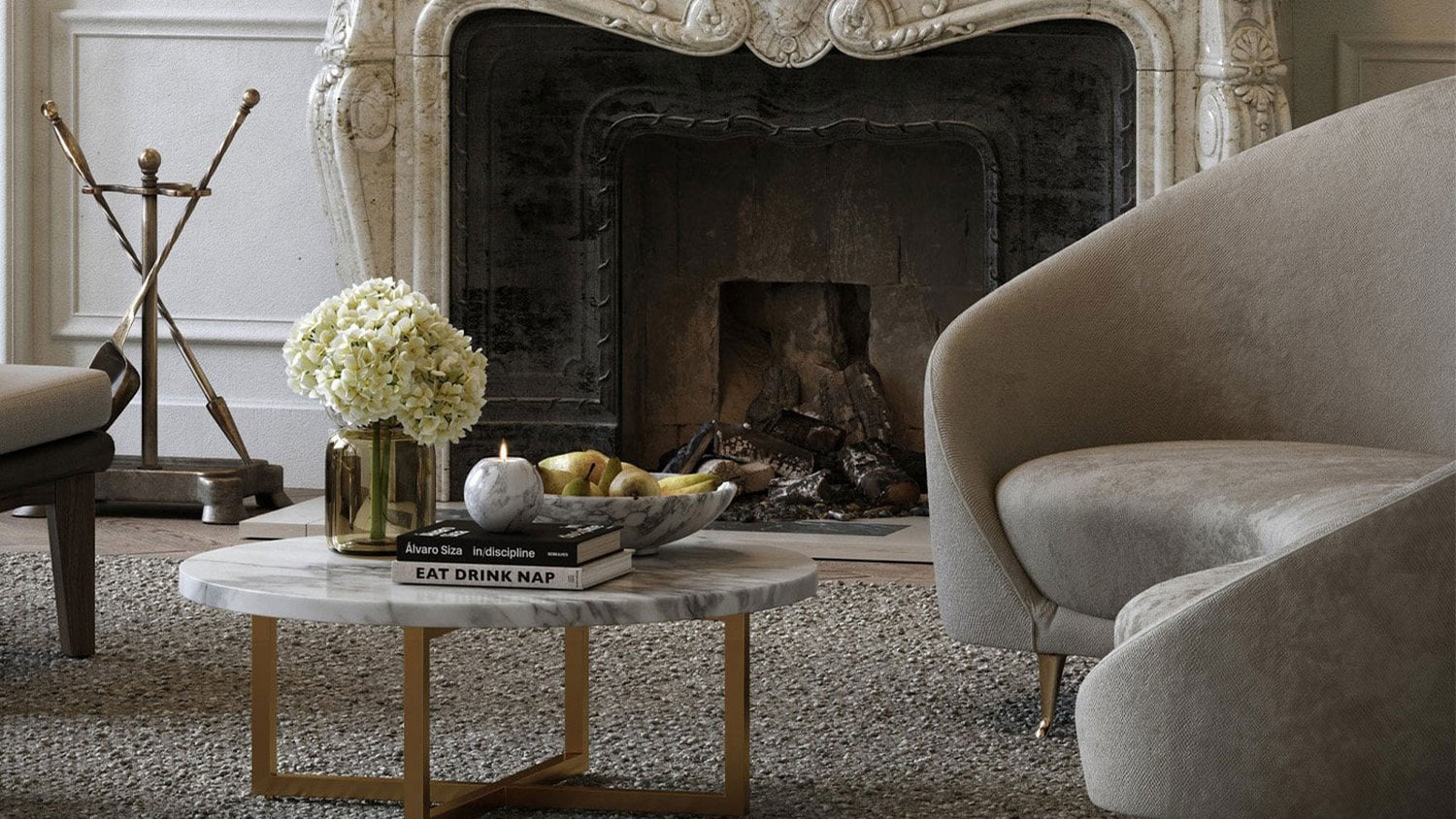 Living room with a fireplace, sofa, and coffee table with decor items.