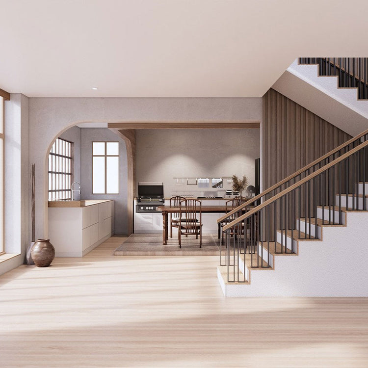 Modern interior with staircase, kitchen, and dining area.