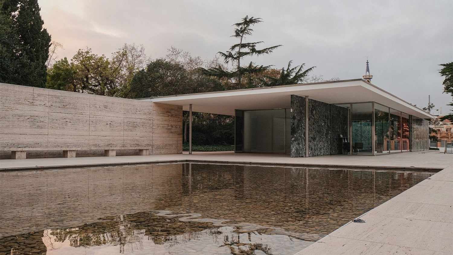 Modern architectural building with a pool in front