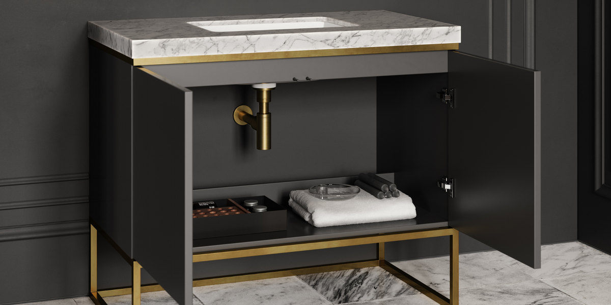 Bathroom vanity with marble countertop and open cabinet revealing toiletries.