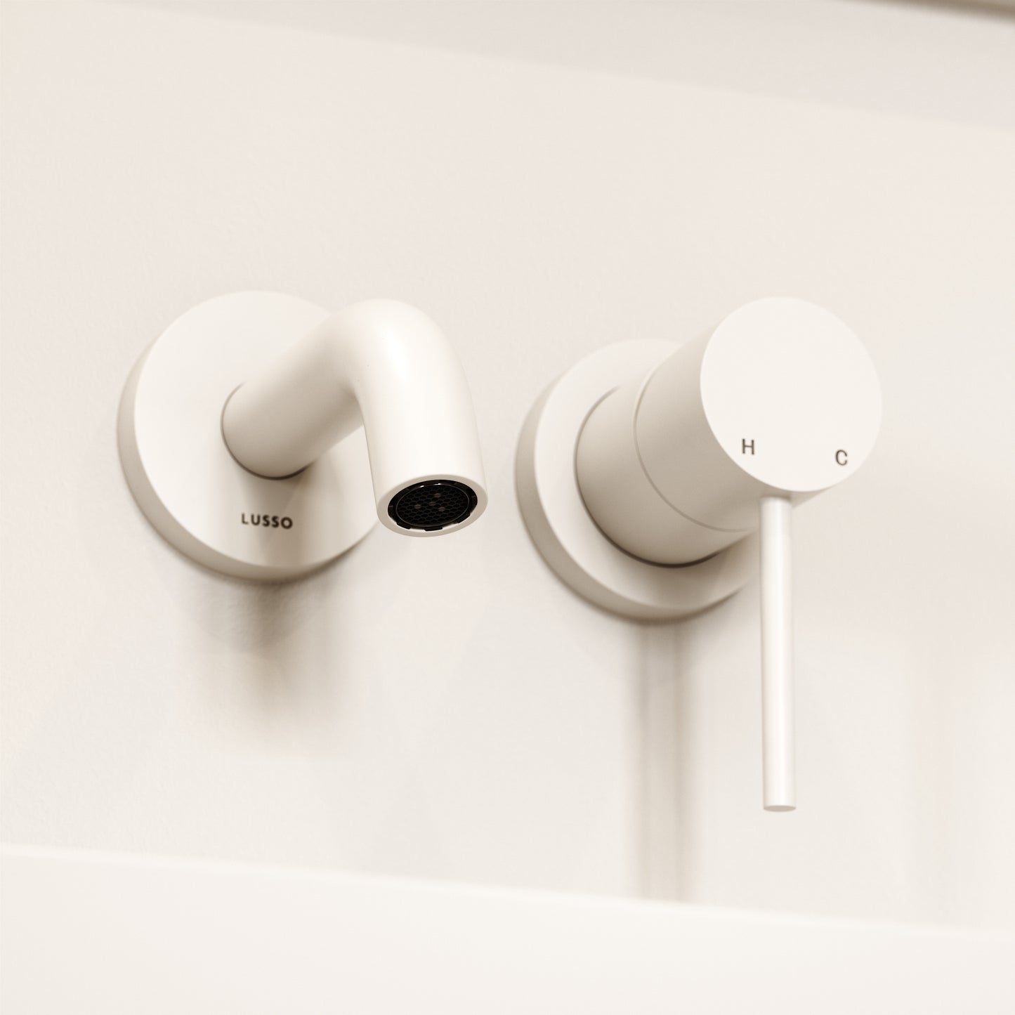 Luxe Matte White Short Projection Wall Mounted Basin Mixer Tap