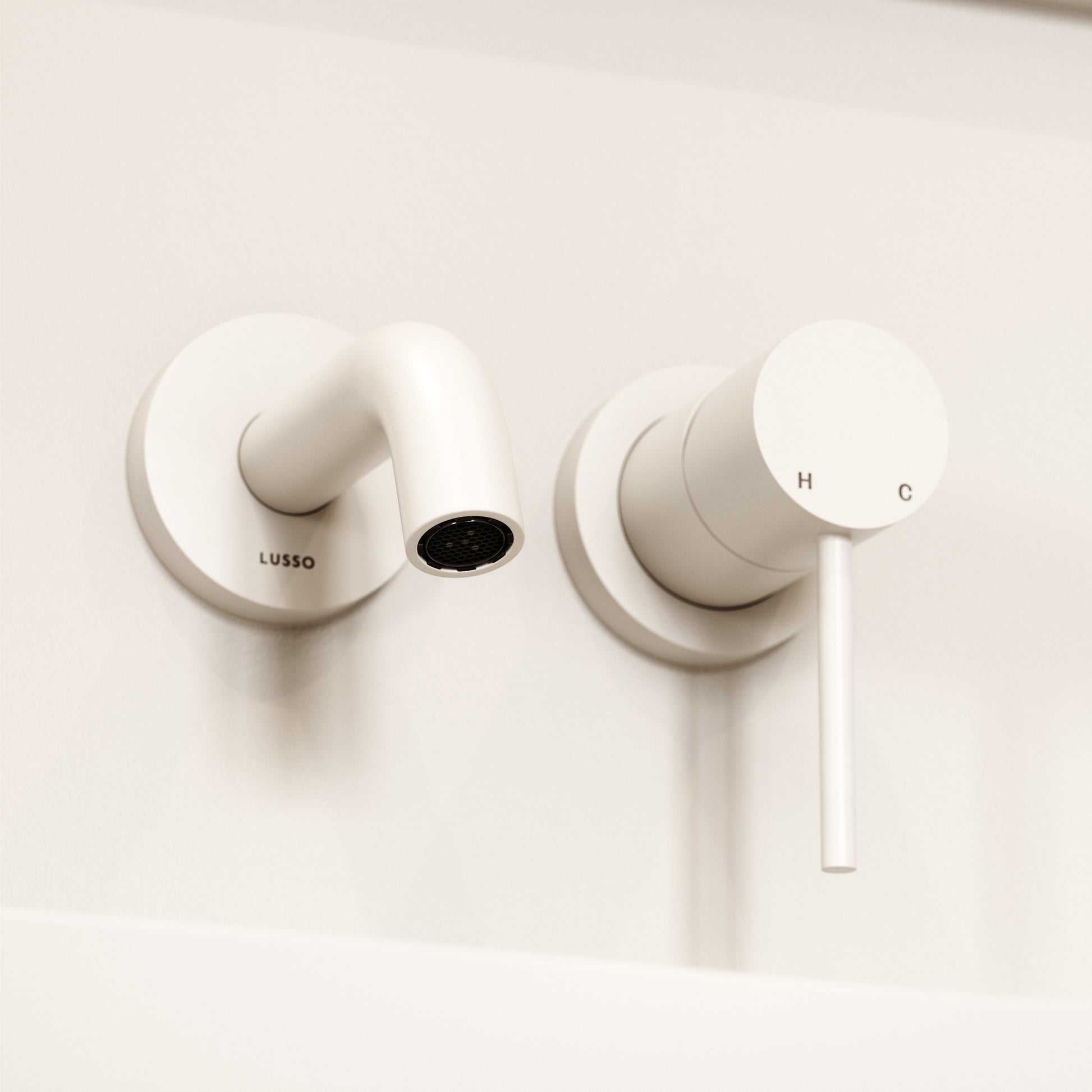 Luxe Matte White Short Projection Wall Mounted Basin Mixer Tap